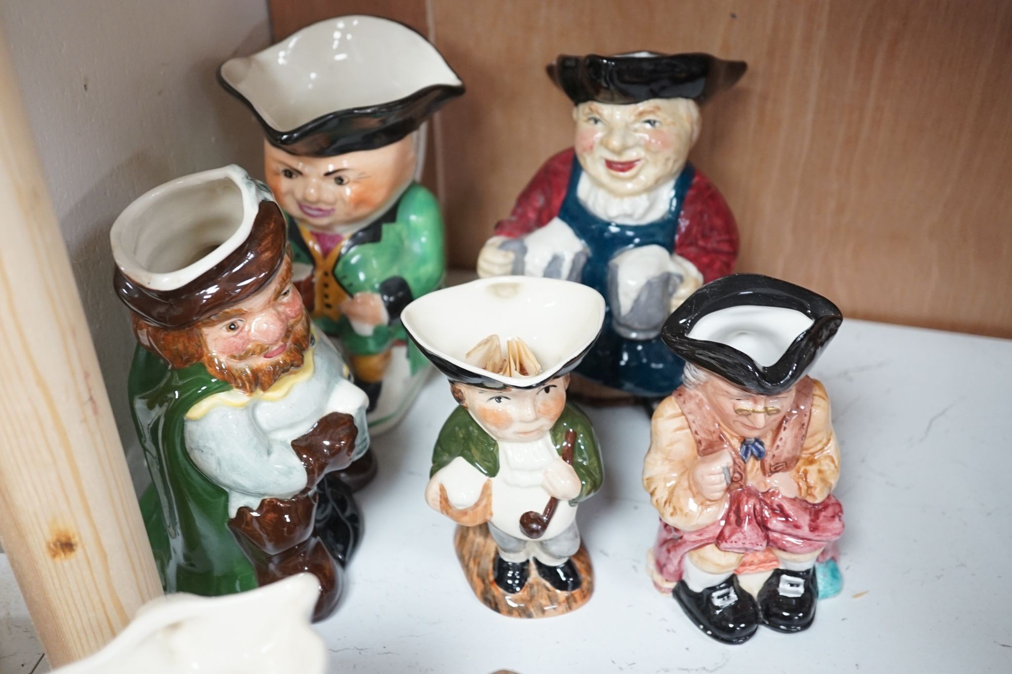 Seventeen various Toby jugs, tallest 15cm
